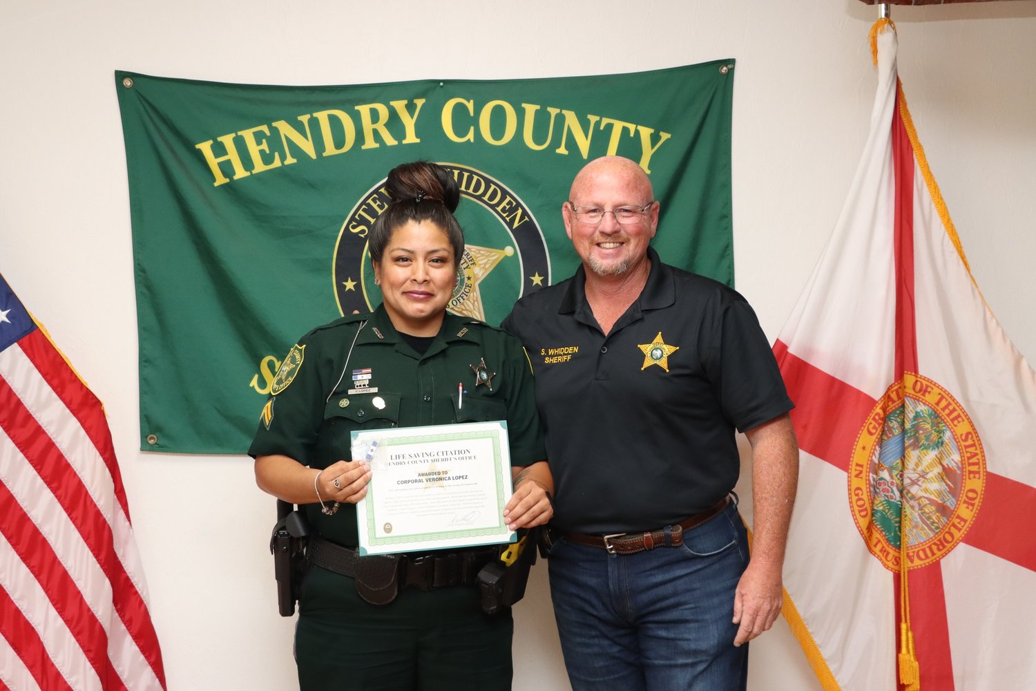 On Wednesday, August 24, 2022, Hendry County Sheriff Steve Whidden presented Corporal Veronica Lopez the Life Saving Award for Outstanding Law Enforcement 
Performance.